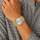 Titan Quartz Analog Men's Watch with Date display and Silver Dial with Golden Stainless Steel Strap,1712YM02