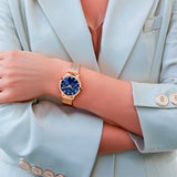 Titan Women's Watch Sparkle Collection Multifunction, Blue Dial Rose Gold Stainless Strap, 2569WM05