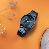 Titan Edge Metal Ladies Allure Women's Watch Analog Rich Mother Of Pearl Dial With Blue Stainless Steel Band, 2734QM02
