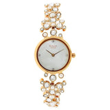Titan Raga Women's Watch with Mother Pearl dial and Stone Studded Metal Strap, 95032WM01