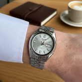 Seiko Men's Mechanical Watch Analog, Silver Dial with Silver Stainless Band, SNXS73K