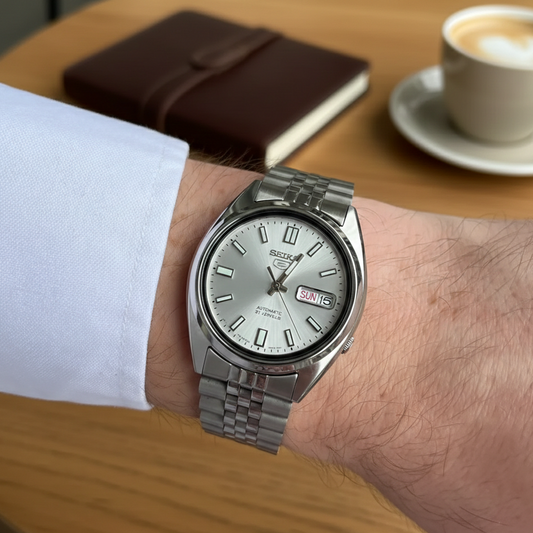 Seiko Men's Mechanical Watch Analog, Silver Dial with Silver Stainless Band, SNXS73K