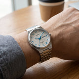 Casio Men's Analog Watch with Arabic White Dial and Silver Stainless Steel Band, MTP-E735AR-7AVDF
