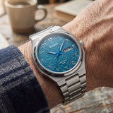 Casio Men's Analog Watch with Arabic Turquoise Blue Dial and Silver Stainless Steel Band, MTP-E735AR-2A3VDF