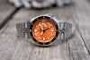 Seiko 5 Men's Automatic Watch Analog Orange Dial with Black Stainless Steel Band, SRPK35K