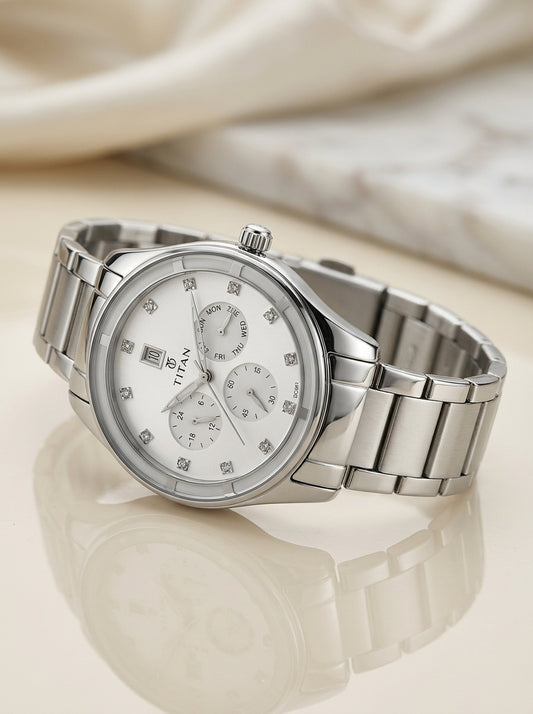 Titan Purple Women's Watch Analog White Dial with Silver Stainless Steel Band, 9967SM01