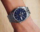 Seiko 21 Jewels Men's Automatic Watch Analog Blue Dial with Silver Stainless Steel Band, SNK357K