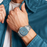 Titan Karishma Men's Watch Analog Blue Dial with Date & Silver Stainless Steel Band, 10038SM01
