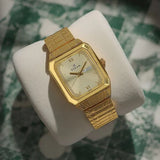 Titan Quartz Analog Men's Watch Champagne Dial With  Gold Stainless Steel Strap,1581YM05