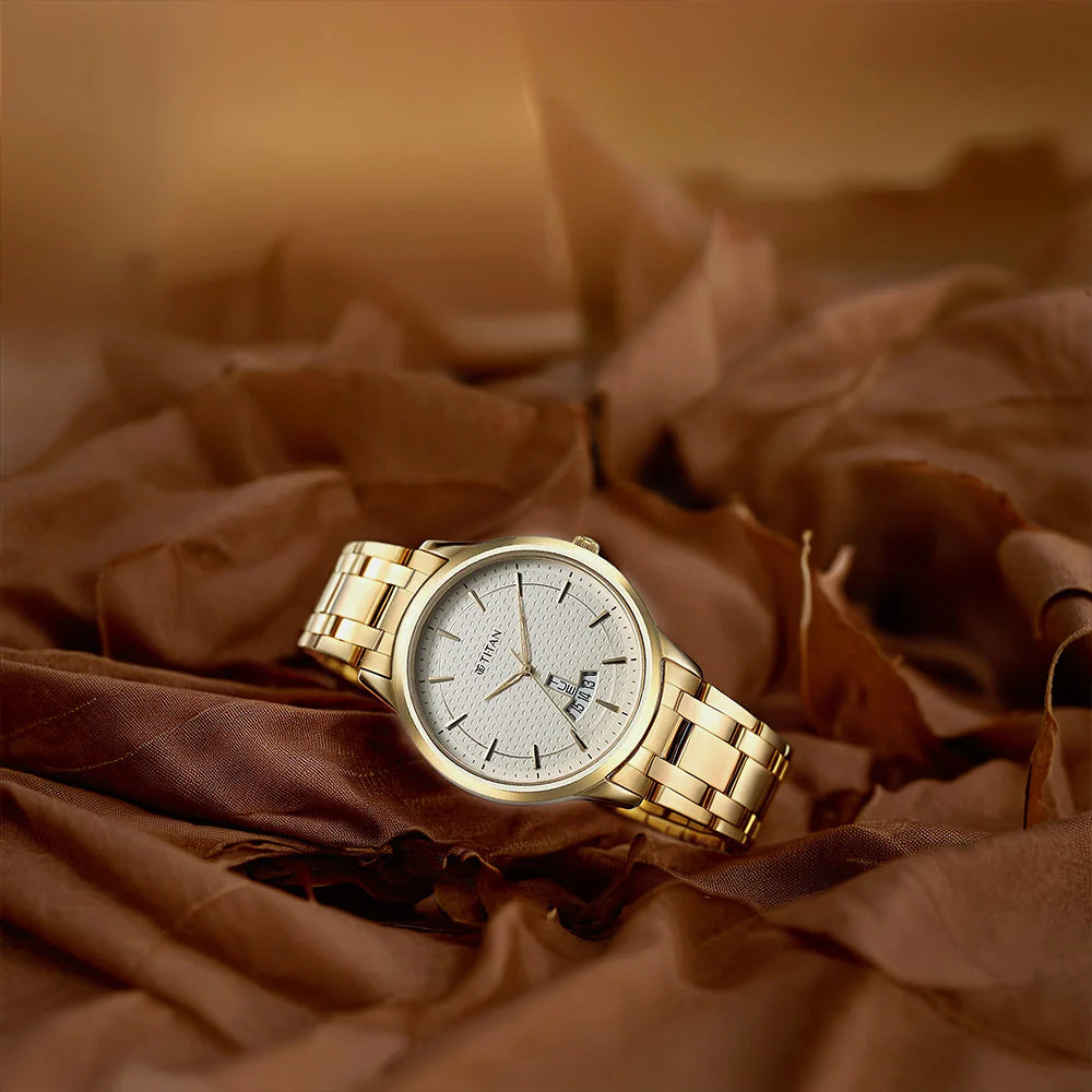 Titan Karishma Men's Watch Analog Champagne Dial With Gold Stainless Steel Band, 1825YM12