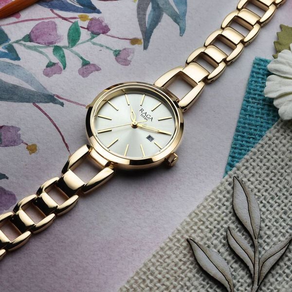 Titan Raga Viva Women's Watch Analog Silver Dial with Gold Stainless Steel Band,  2642YM01