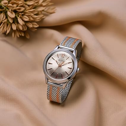 Titan Quartz Women's Analog Pink Dial Metal Strap Watch 95287KM01