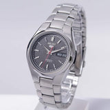 Seiko 21 Jewels Men's Automatic Watch Analog Black Dial with Silver Stainless Steel Band, SNK607K
