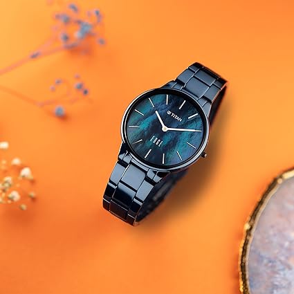 Titan Edge Metal Ladies Allure Women's Watch Analog Rich Mother Of Pearl Dial With Blue Stainless Steel Band, 2734QM02