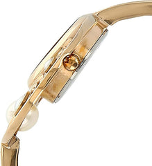 Titan Raga  Women's Watch Analog Mother of Pearl Dial With Gold Stainless Steel  Band, 9972WM01