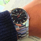 Seiko 21 Jewels Men's Automatic Watch Analog Black Dial with Silver Stainless Steel Band, SNK617K