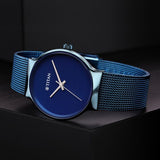 Titan Slimline Women's Watch Analog Blue Dial with Blue Mesh Band, 95141QM01