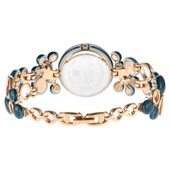 Titan Analog Women's Watch Analog Blue Dial With Green Stainless Steel  Band, 95148KD02