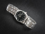 Seiko 21 Jewels Arabic Dial Men's Watch Analog Black Dial with Silver Stainless Steel Band, SNK063J5