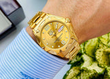 Seiko 5 Sports Analog Men's Watch with Day and date and Gold Dial with Gold Stainless Steel strap,SNZ460J